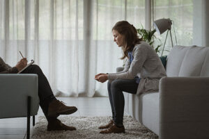 patient talking to therapist in an office setting discussing anxiety treatment options