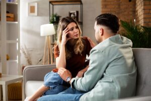 man and woman talking as one is concerned about the signs of benzo abuse in a loved one