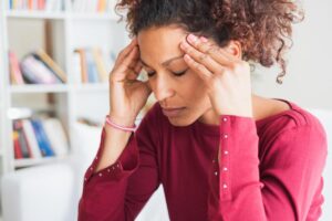 young woman looking distraught as she struggles with recognizing benzo side effects